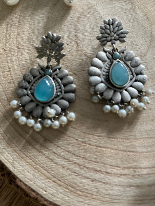 Oxidised antique earrings in intense flower