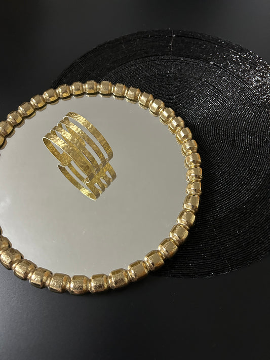 Brass bracelet with spiral