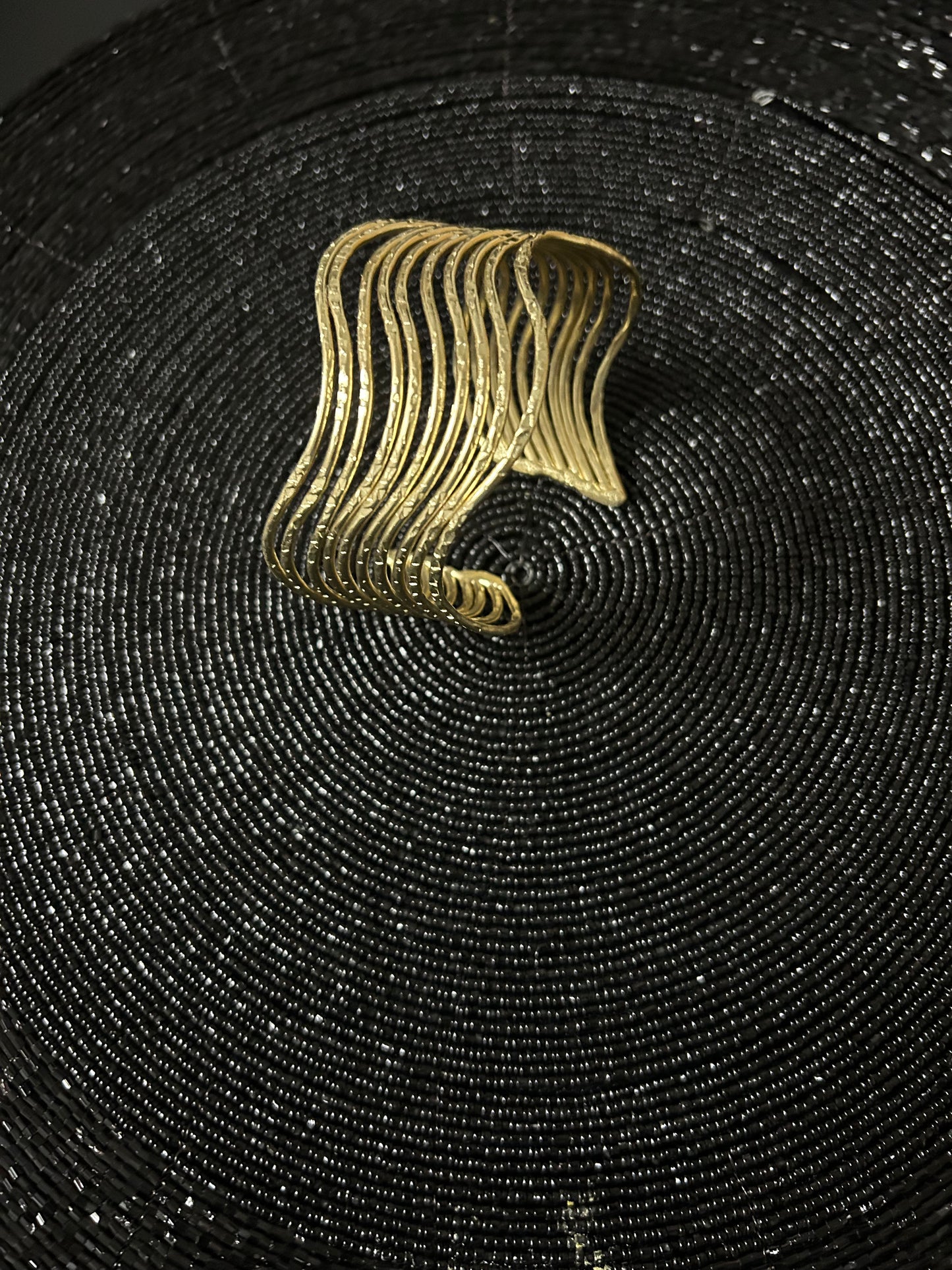 Brass bracelet with wavy thin spiral