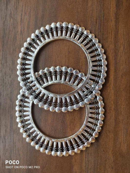 Oxidized Kolhapuri bangles with concentric pins design