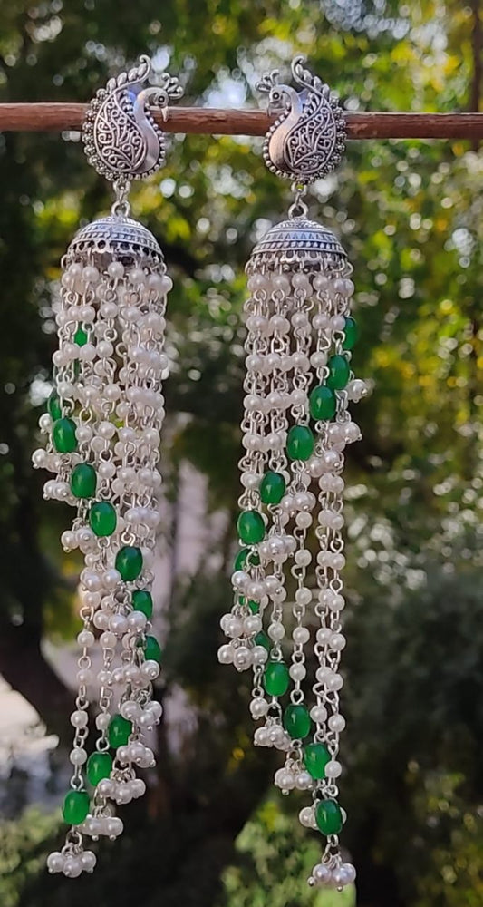 Oxidized long jhumki with white and green beads