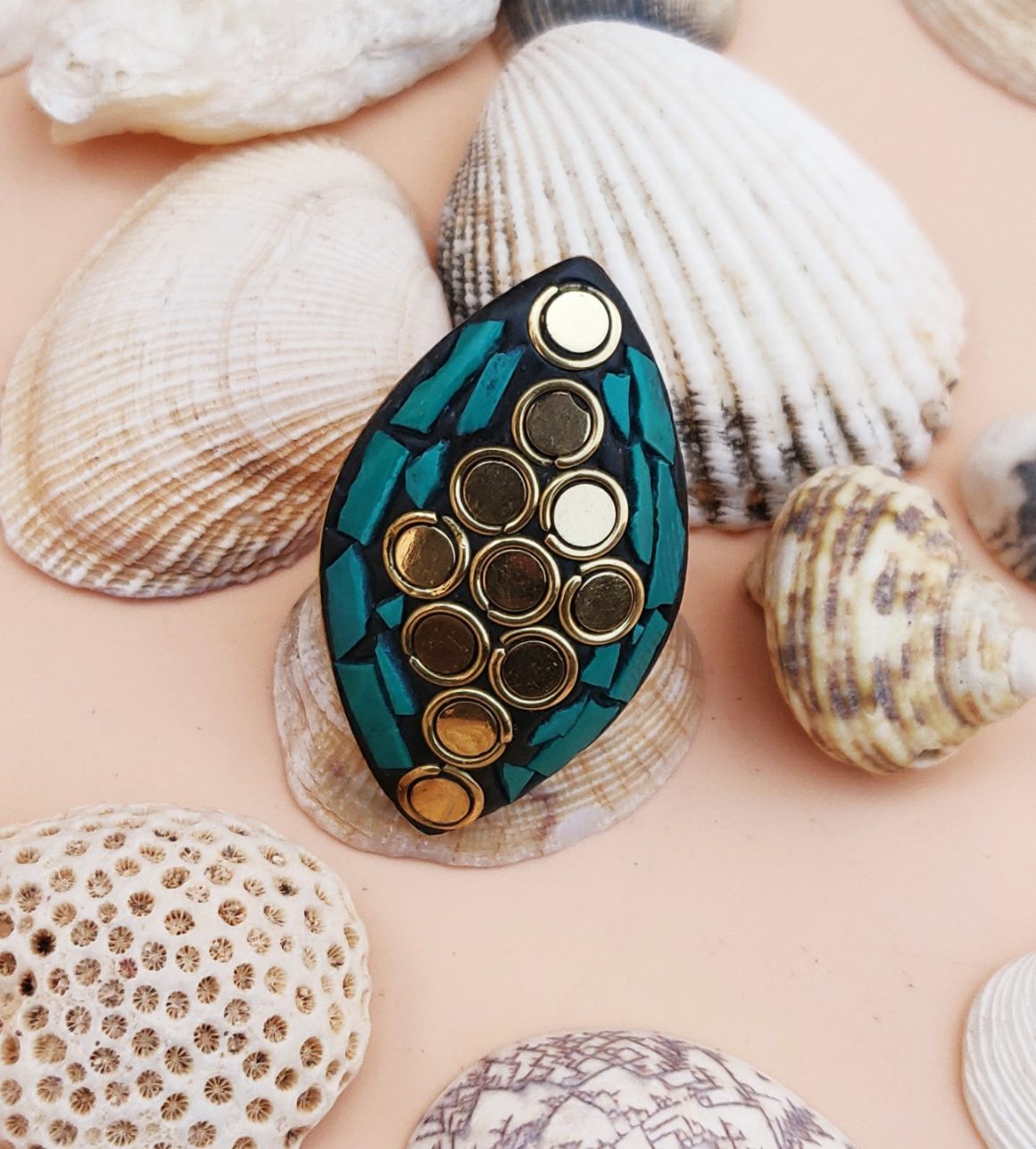 Tribal oval ring in green and golden