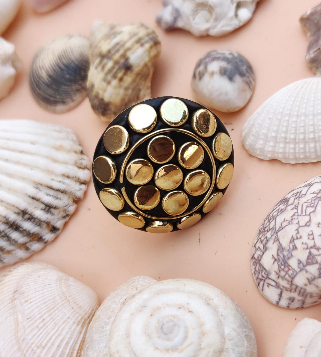 Tribal round ring with golden dots