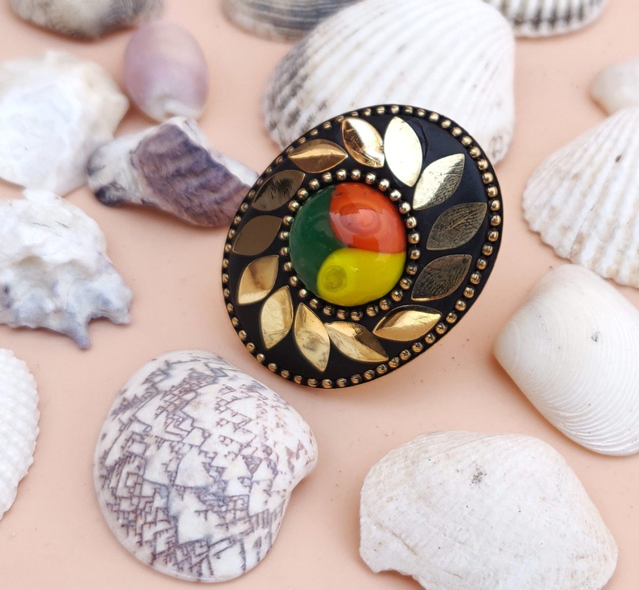 Tribal drop ring with golden leaves