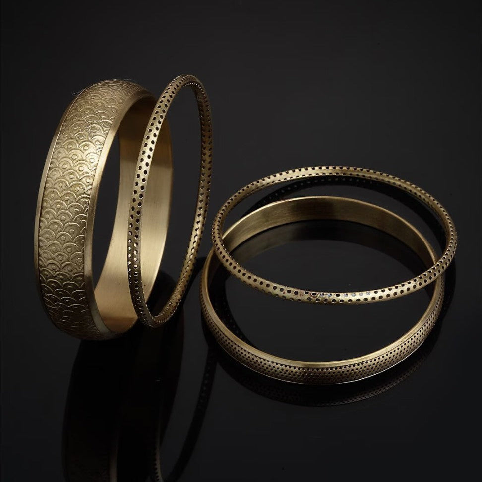 Set of 4 brass bangles