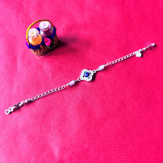 Rakhi- Silver rakhi with evil eye