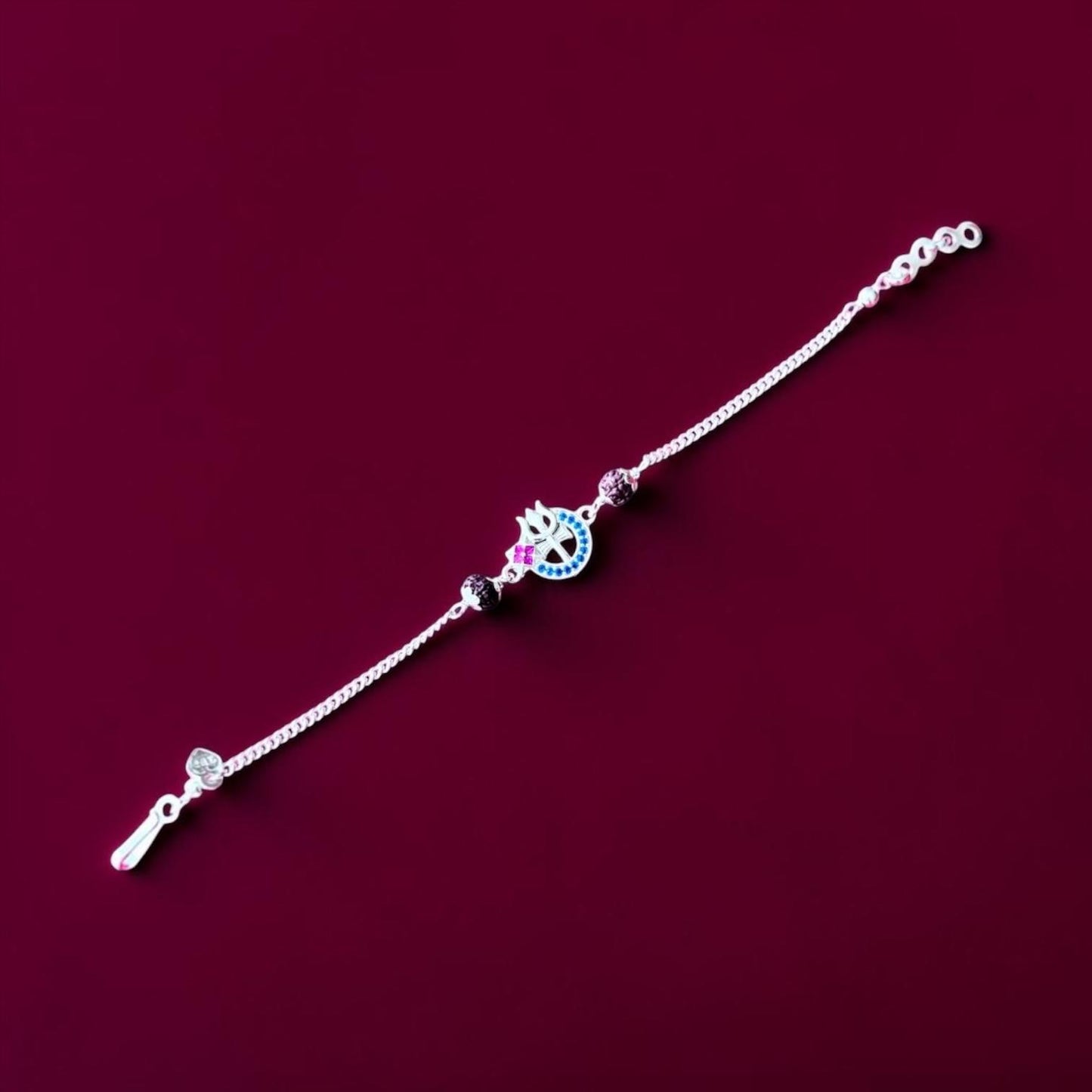 Rakhi- Silver rakhi with Trident & Rudraksha