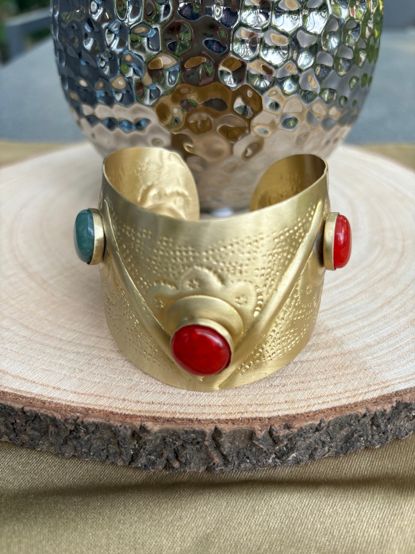 Brass bracelet with green, red, yellow faux stones