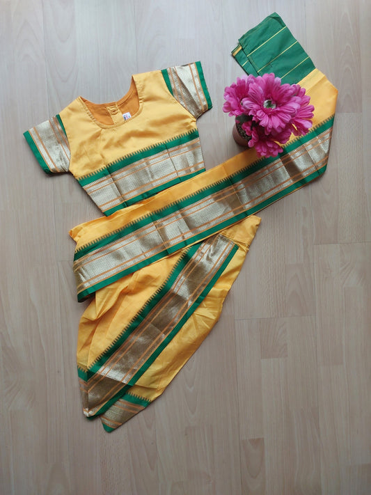 Lemon yellow coloured 9 yards Nauvari with matching blouse for girls (Buy or Rent)