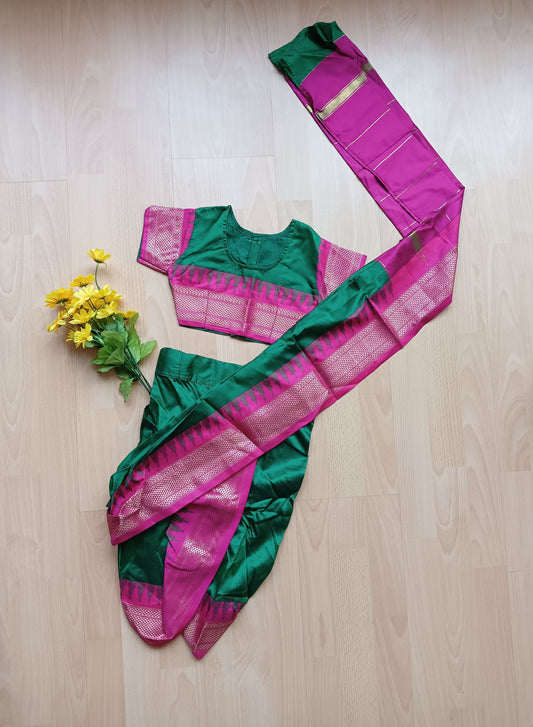 Dark green coloured Nauvari saree with matching blouse (Buy or Rent)
