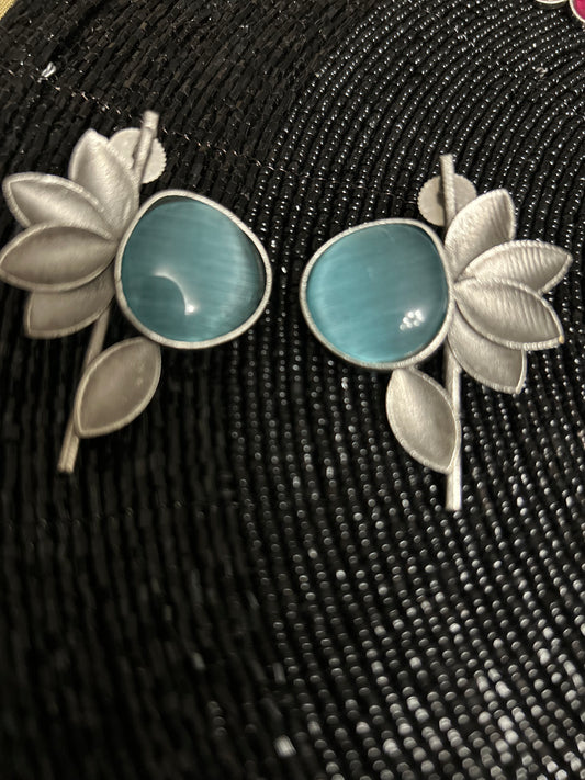 Oxidised antique earrings with blooming blue flower