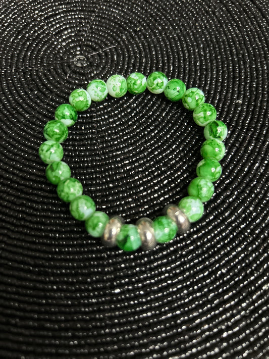 Elegant glass beads bracelet - light green colour