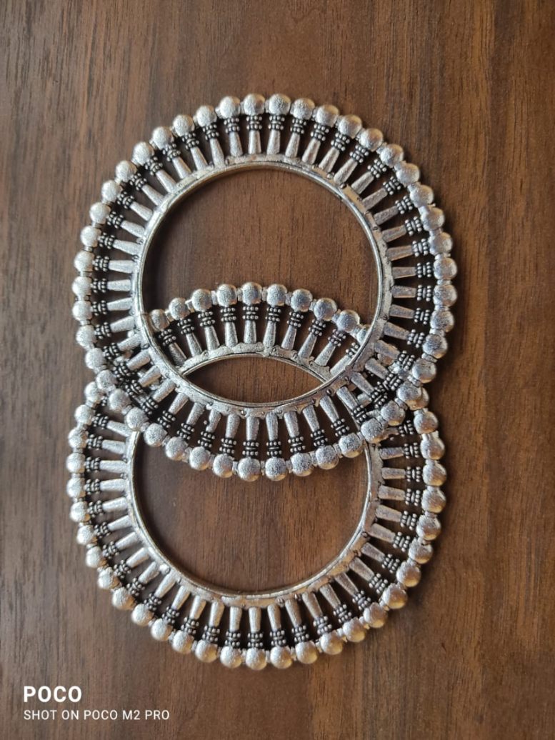 Oxidized Kolhapuri bangles with concentric pins design