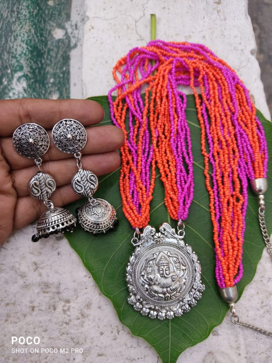 Beaded, oxidized long necklace with Sun pendent