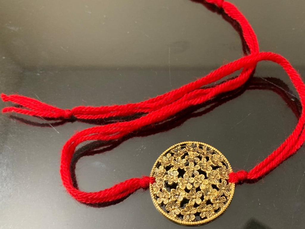 Rakhi - handmade, sun shape