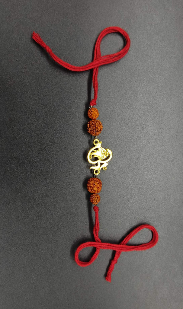 Rakhi - handmade, Ganpati head with imitation Rudraksh, golden colour