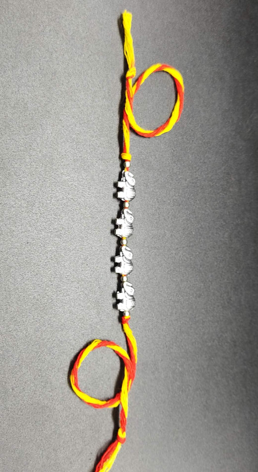 Rakhi - handmade, elephant beads, silver colour