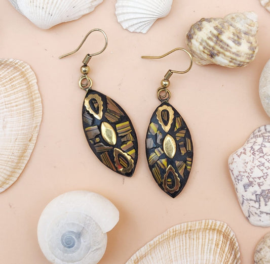 Tribal fish shaped danglers with golden pattern