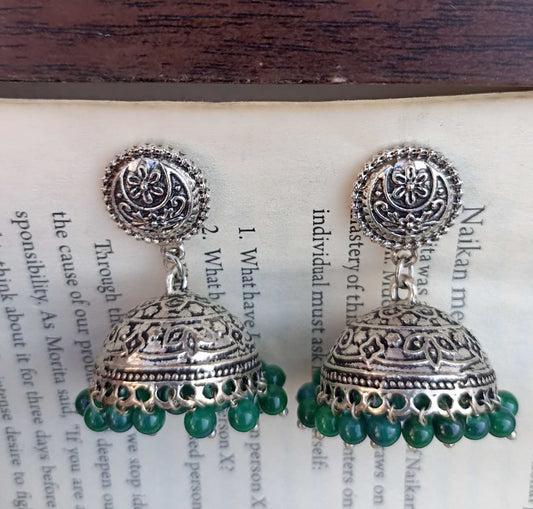 Oxidized Jhumki in silver colour with coin stud and green beads