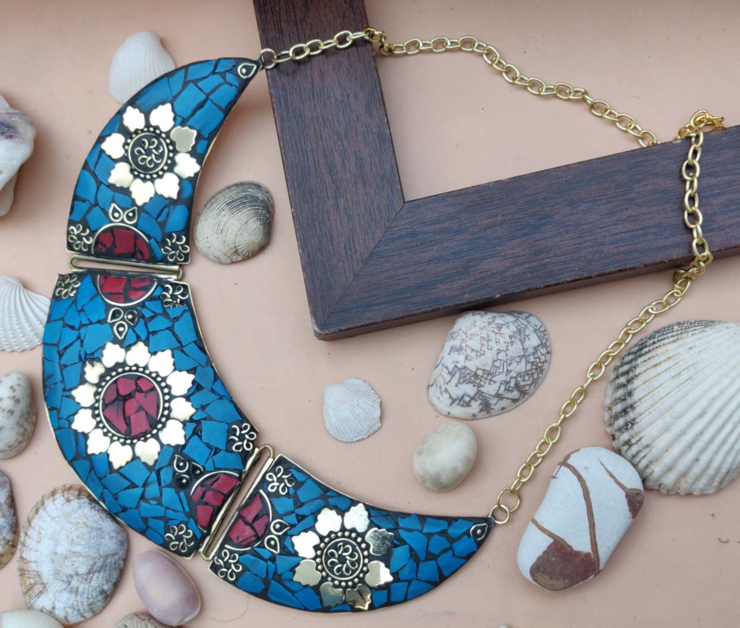 Tribal style blue necklace with golden and red flowers
