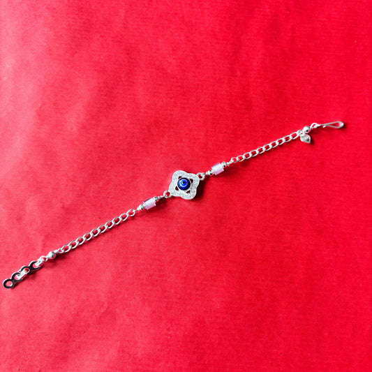 Rakhi- Silver rakhi with evil eye