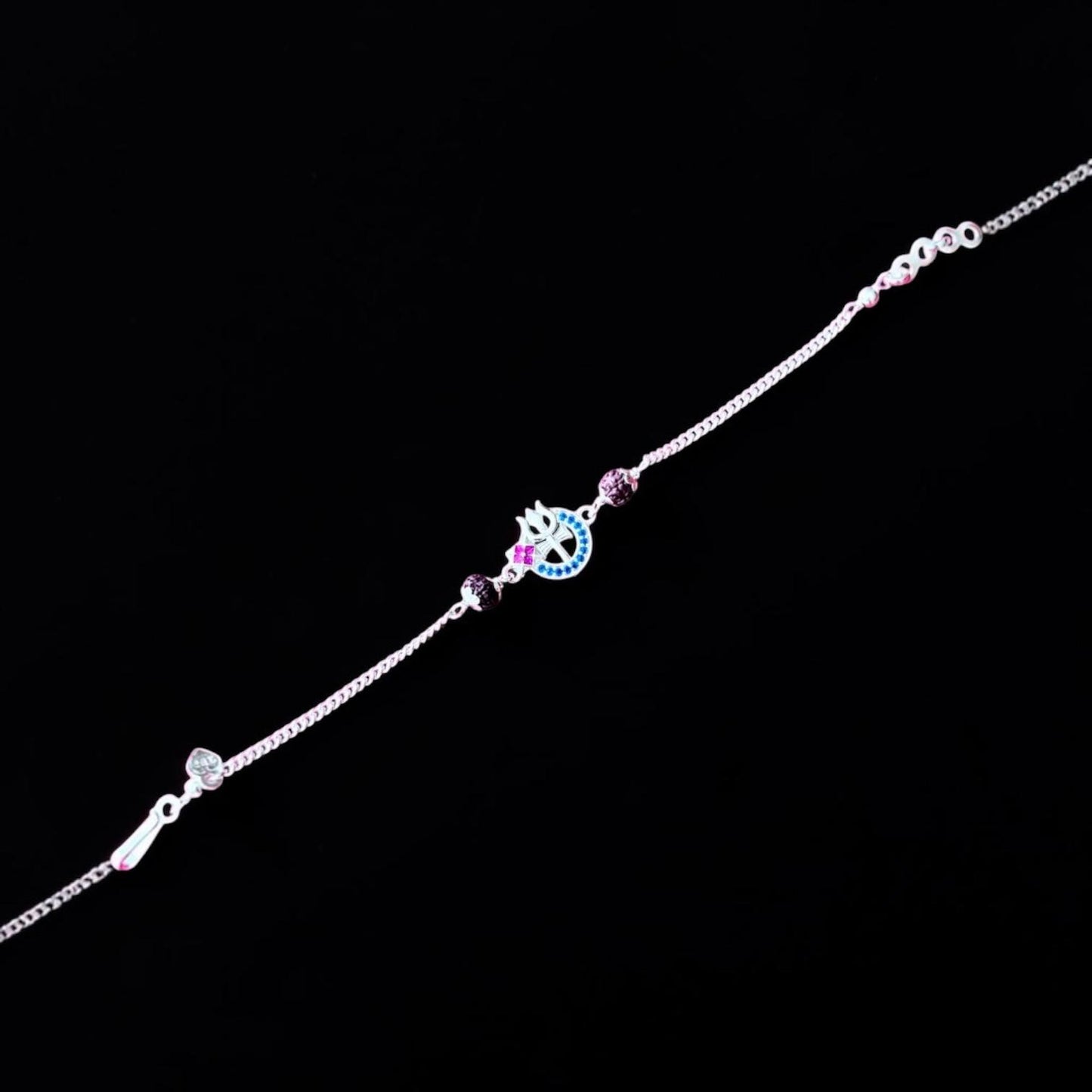 Rakhi- Silver rakhi with Trident & Rudraksha