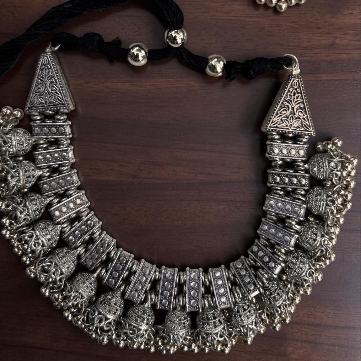 Gapochi oxidised silver tribal choker necklace with intricate filigree jhumki drops and black cord tie
